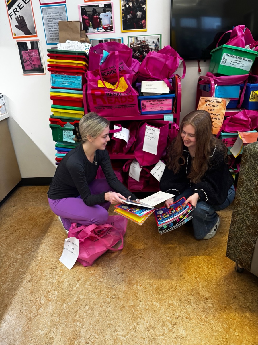 Kaytlyn and Dina picking up books from the Berkeley Public Library